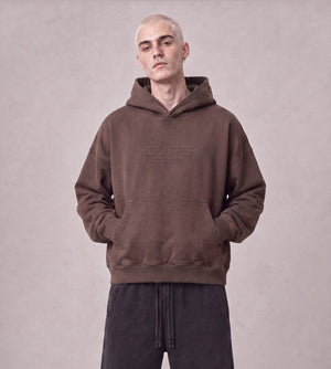 Essential Oversized Hoodie in Coffee, front view on model