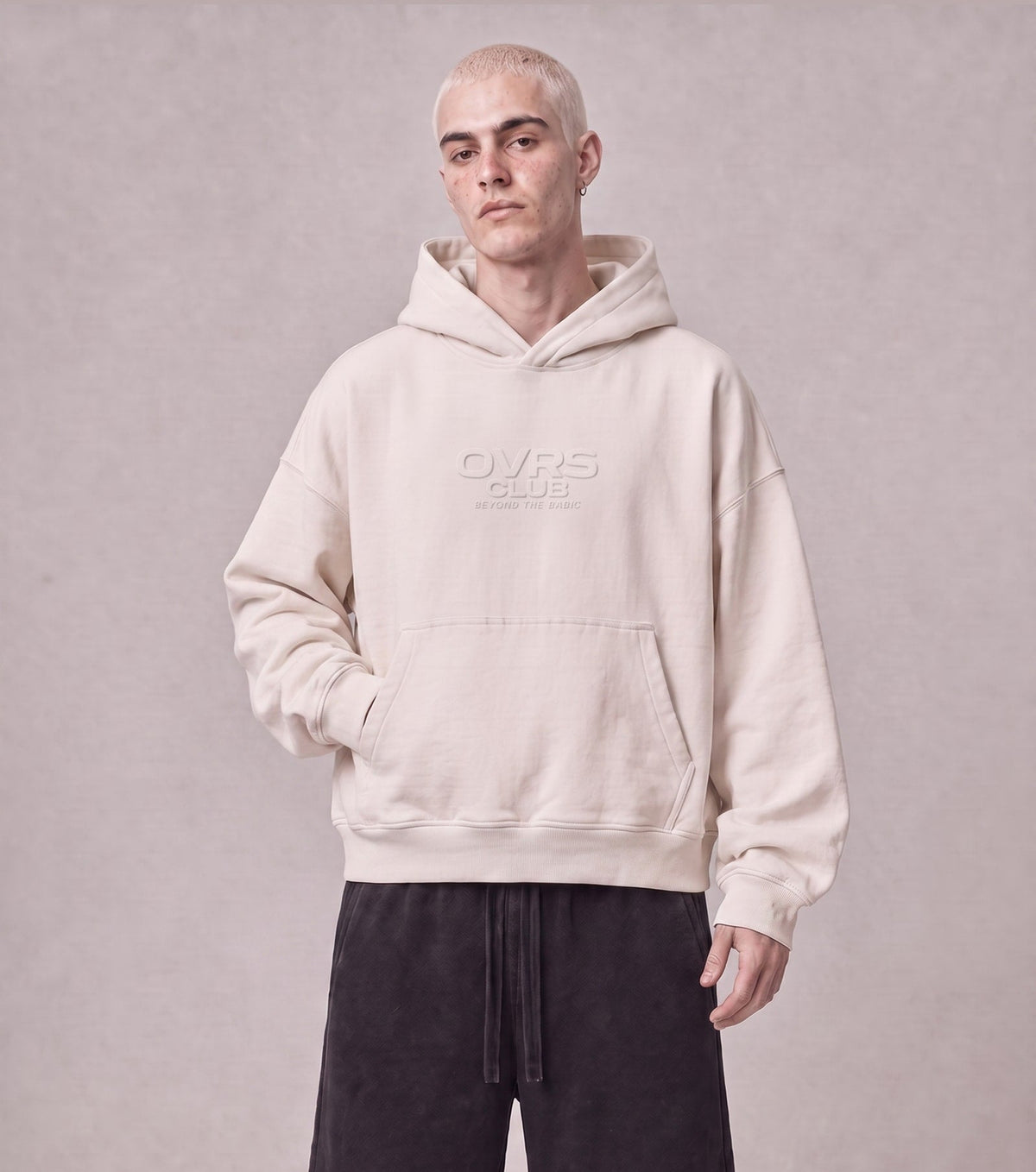 Essential Oversized Hoodie in Off-White, front view on model